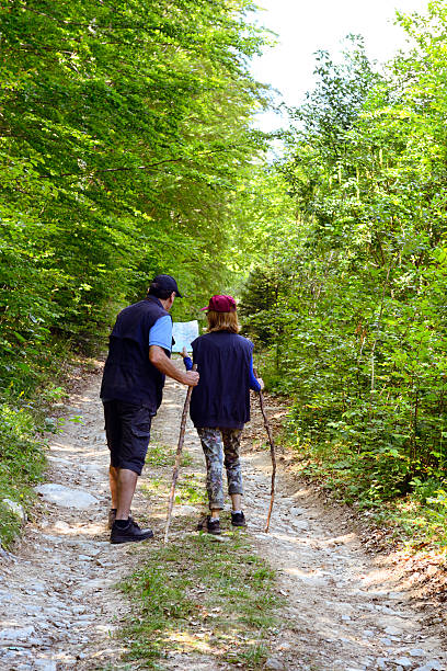 istock Senior Couple Hiking 177343402