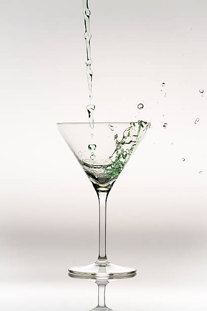 istock Splash of liquor inside a cocktail glass 177343931