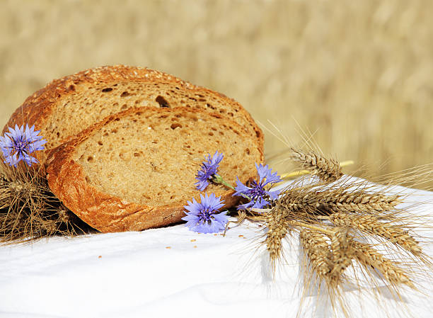 istock Bread and wheat outdoors 177344198