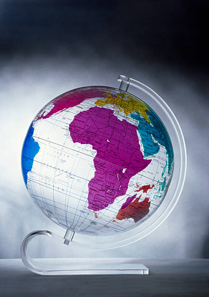 Perspex globe "Perspex globe on shadowy background showing Africa, Europe and Australia" perspex stock pictures, royalty-free photos & images