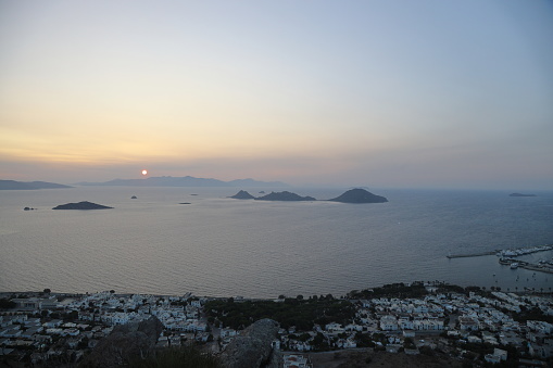 Bodrum,Turkey. 04 October 2023: Seaside town of Turgutreis and spectacular sunsets. aerial view of islands and sea