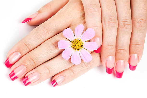 istock Woman hands with pink manicure 177345936