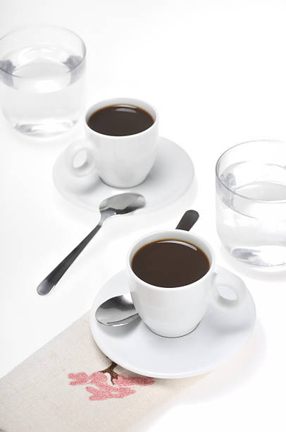 istock Coffee cups and glasses of water on a white background 177345961