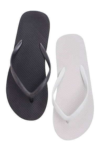 istock Pair of black and white flip flops 177346497