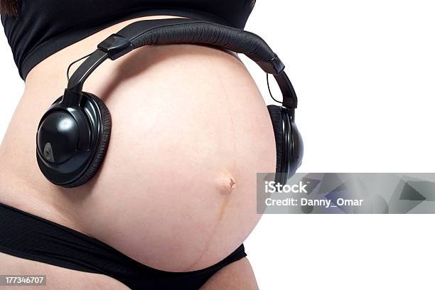 Close Up Of A Pregnant Belly With Headphones Stock Photo - Download Image  Now - 20-24 Years, Abdomen, Adult - iStock