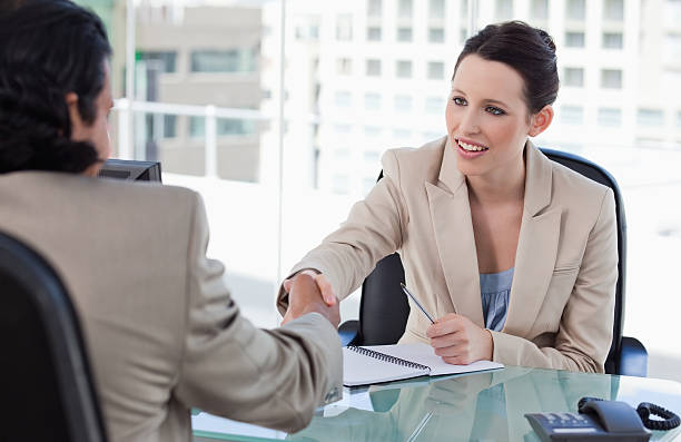 istock Manager shaking the hand of a male applicant 177346972