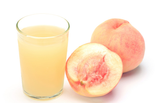 I took juice and peach in a white background.