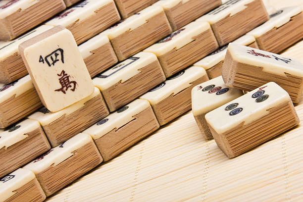 istock Old chinese game mahjongg on bamboo mat background 177347183
