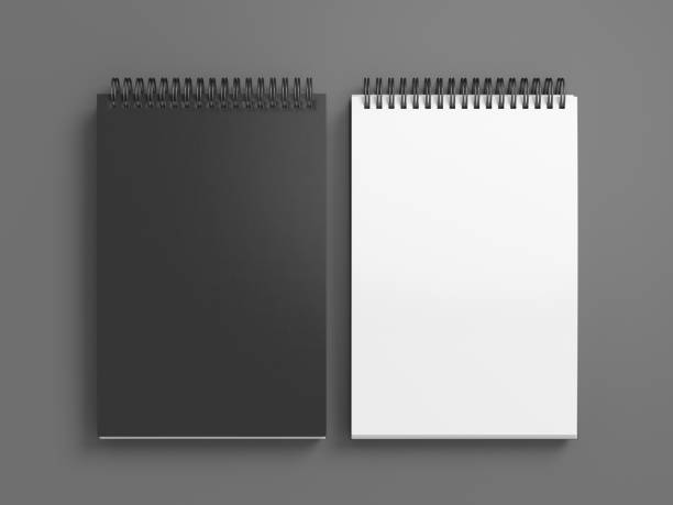 istock Notebook mockup. Closed and open blank notebook with black cover. Spiral notepad on gray background 1773481215