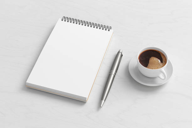 Notebook mockup. Blank workplace notebook. Spiral notepad on white wooden desk. 3d illustration