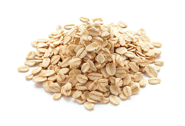 flocons d'avoine - heap stack oat oatmeal photos et images de collection