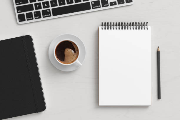 istock Notebook mockup. Blank workplace notebook. Spiral notepad on white wooden desk 1773485108