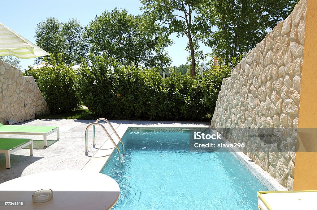 Outdoor swimming pool at luxury villa, Pieria, Greece "Outdoor swimming pool at luxury villa, Pieria, Greece" Beauty In Nature Stock Photo