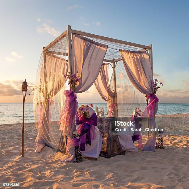 Decorative Canopy On Caribbean Beach At Sunset Stock Photo - Download Image Now - Wedding, Caribbean, Caribbean Sea