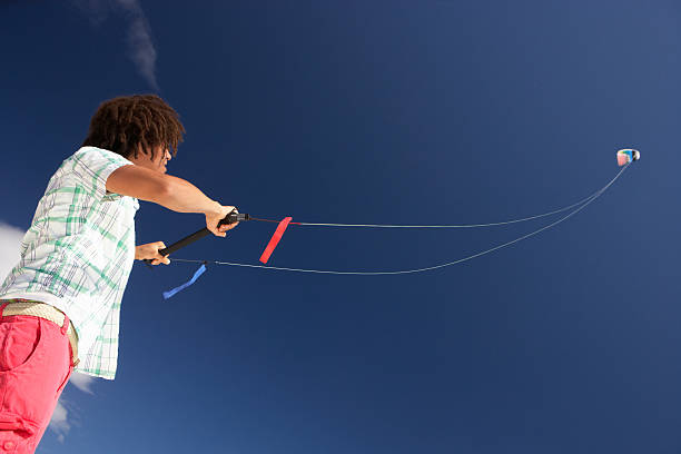 istock Teenage boy flying a kite 177349572