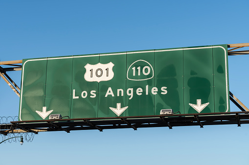 Los Angeles route 101 and 110 freeway arrow sign in Southern California.