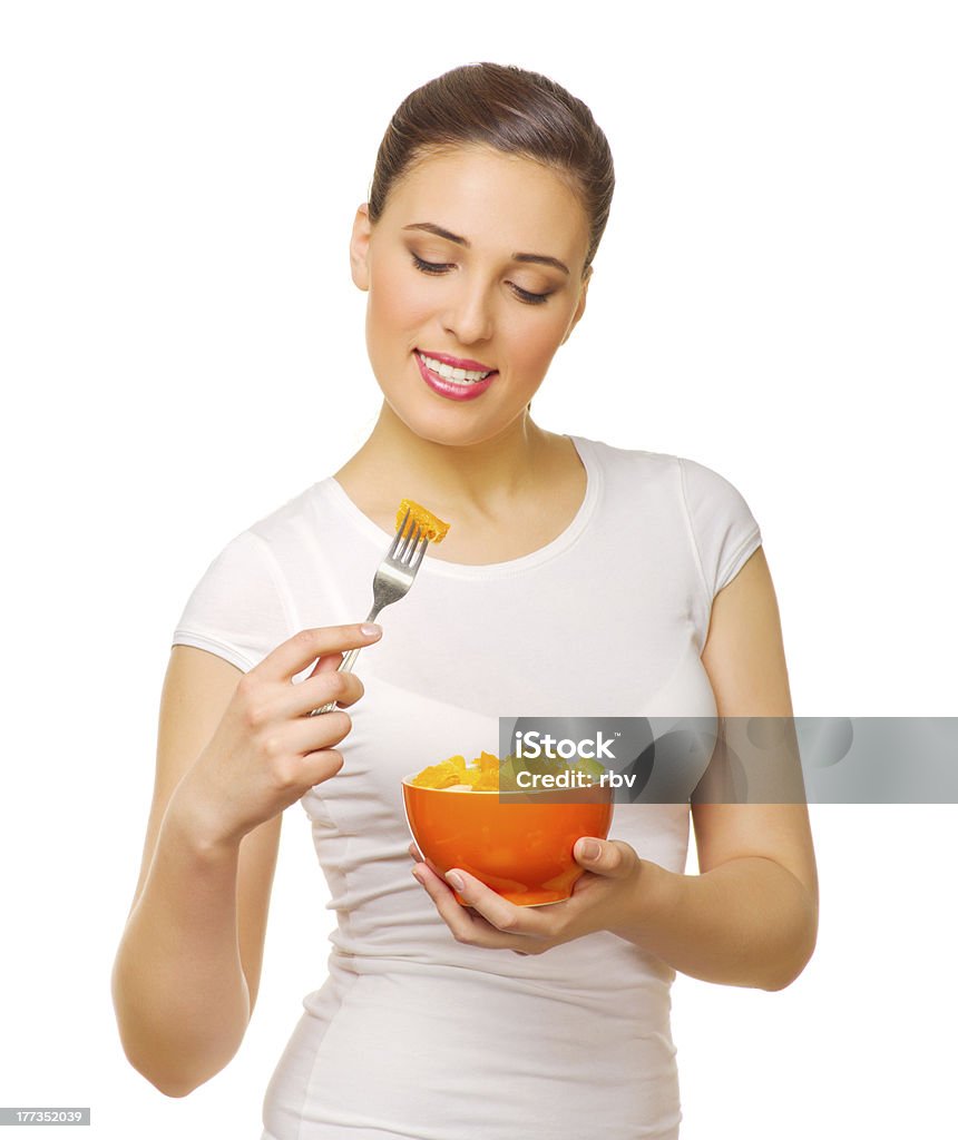 Jeune fille avec une salade de fruits - Photo de Adulte libre de droits