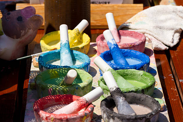 istock Bowls of Paint Sit on Sunlit Table 177352206