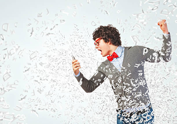 istock Young man shouting at his mobile phone 177352485