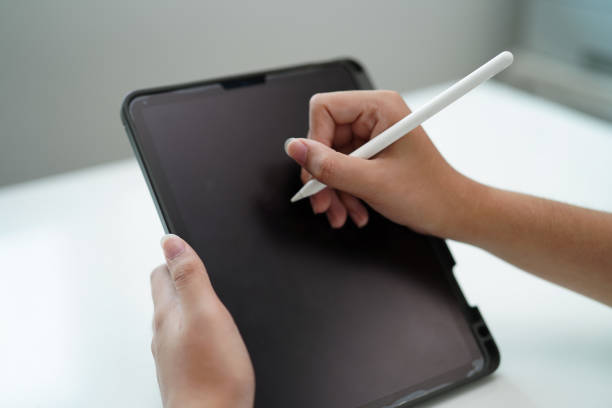 istock Teenage using tablet for communication, search data internet website to learn. 1773528301