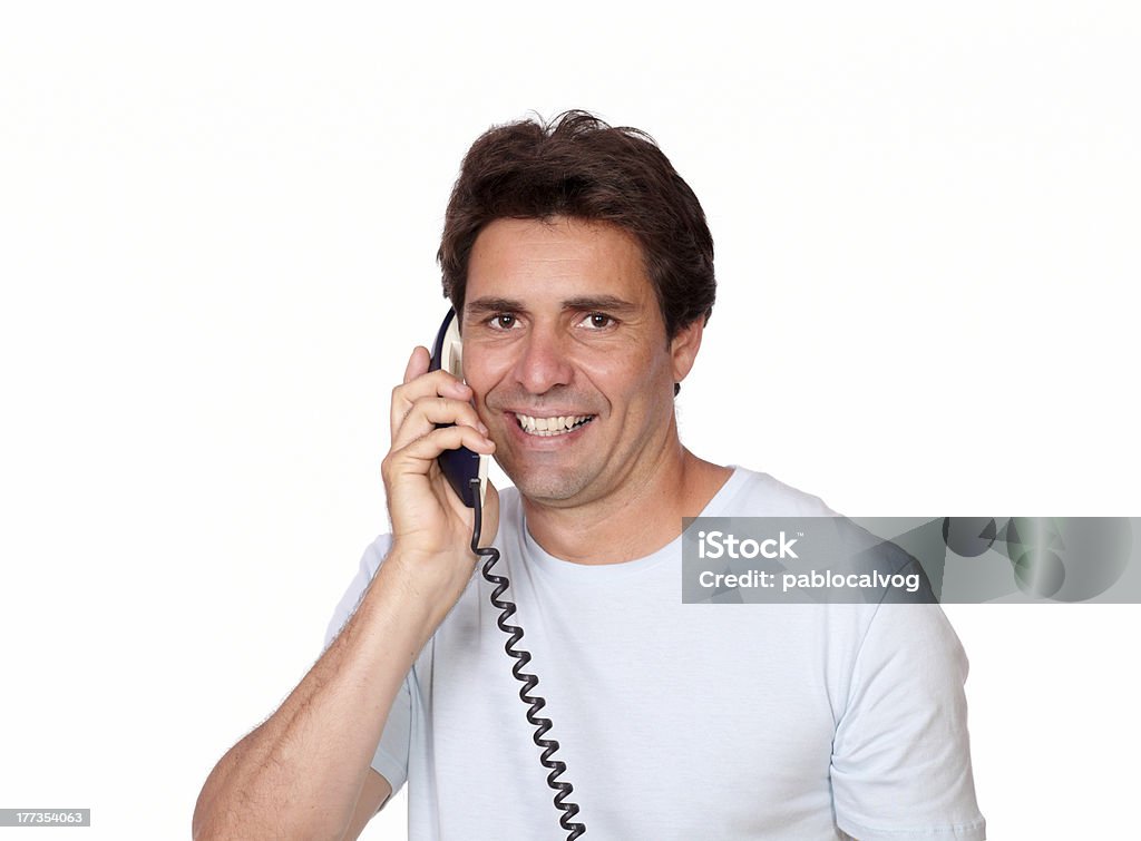 Sorrir letra guy Ter Contactos no telemóvel - Royalty-free A usar um telefone Foto de stock