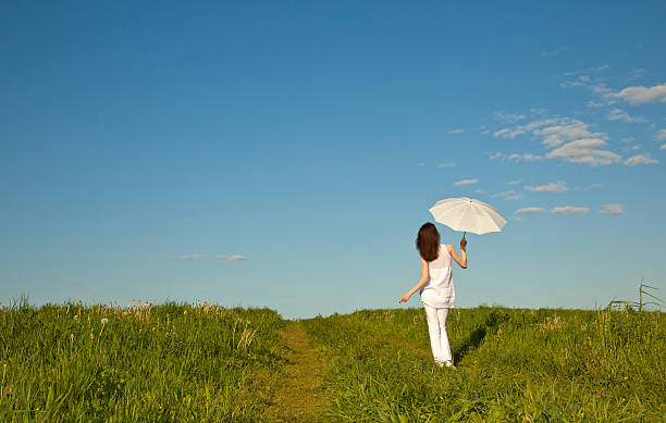 istock Beautiful girl with white umbrella 177356958