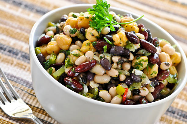 Bean salad Vegeterian salad of various beans in bowl close up bean stock pictures, royalty-free photos & images