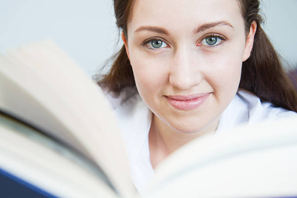istock Pretty girl reading a book 177357865