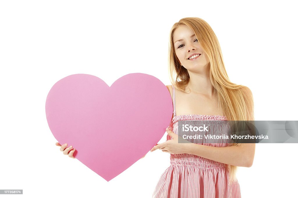 Ragazza felice con grande cuore rosa - Foto stock royalty-free di Adolescente
