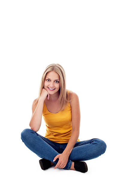 istock Young woman sitting isolated 177358488