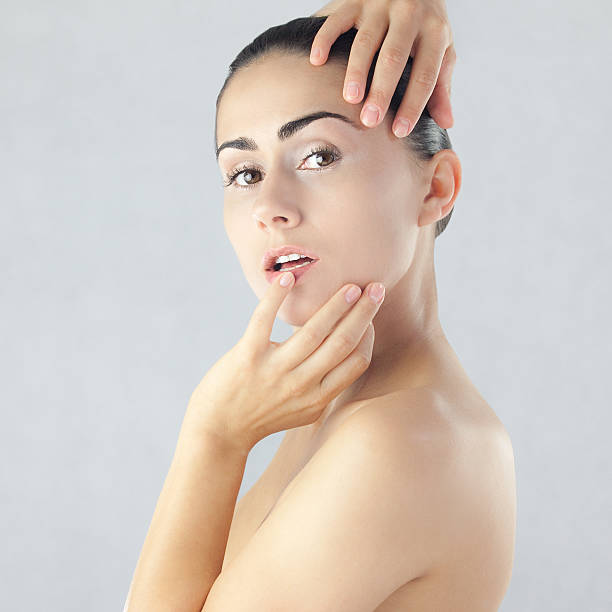 istock young woman covers face with his hands 177358601