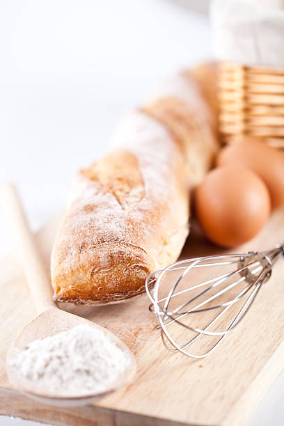 bread, flour, eggs and kitchen utensil