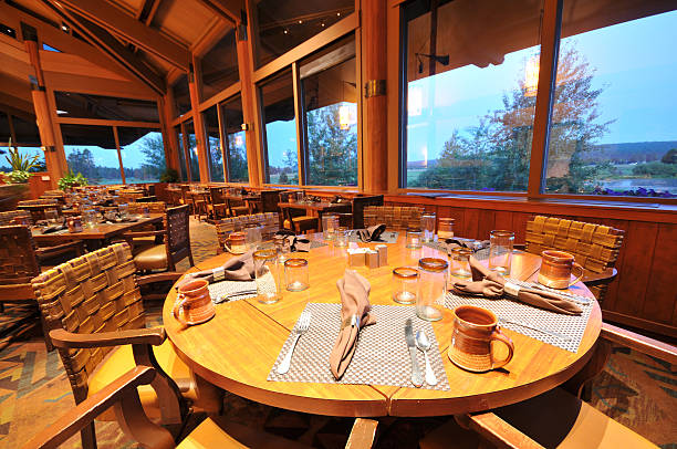 istock Dinning room with tables, chairs and fireplace 177359567
