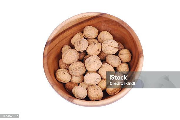 Wooden Plate With Walnuts Stock Photo - Download Image Now - Circle, Cut Out, Food and Drink