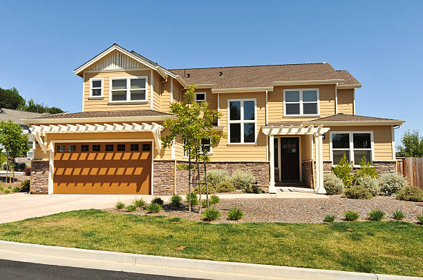 Two story single family house with driveway Single family house with two levels and a short driveway. northern california stock pictures, royalty-free photos & images