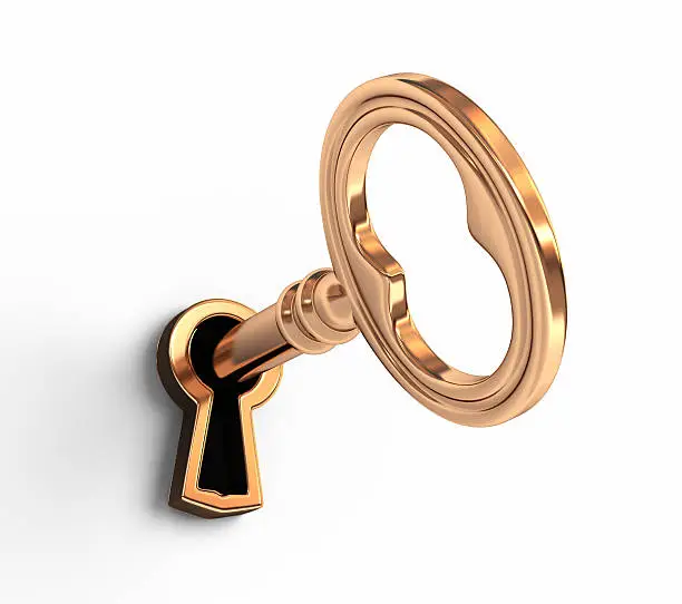 Gold key in keyhole isolated on white