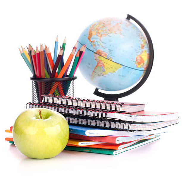 istock An apple next to school supplies and a globe 177363151