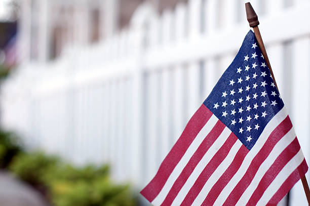 istock American Flag on Mainstreet USA 177363216