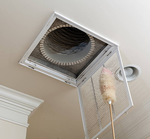istock Senior man opening air conditioning filter in ceiling 177363613
