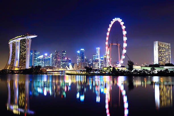 istock Singapore city skyline at night 177364080