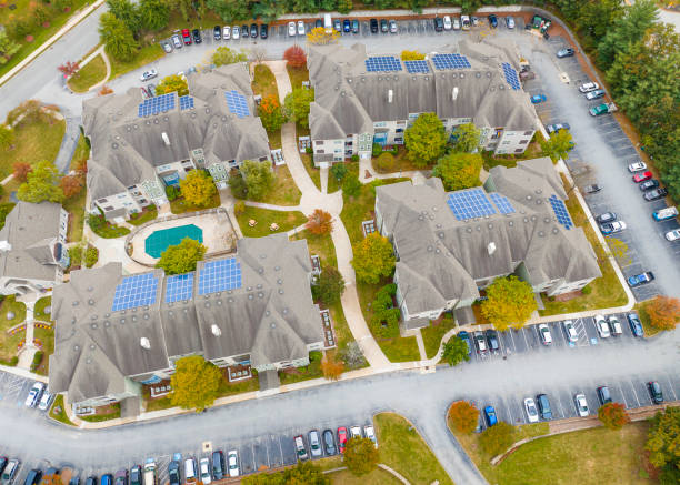 istock aerial view of community with solar panel installed on apartment building roof 1773656771