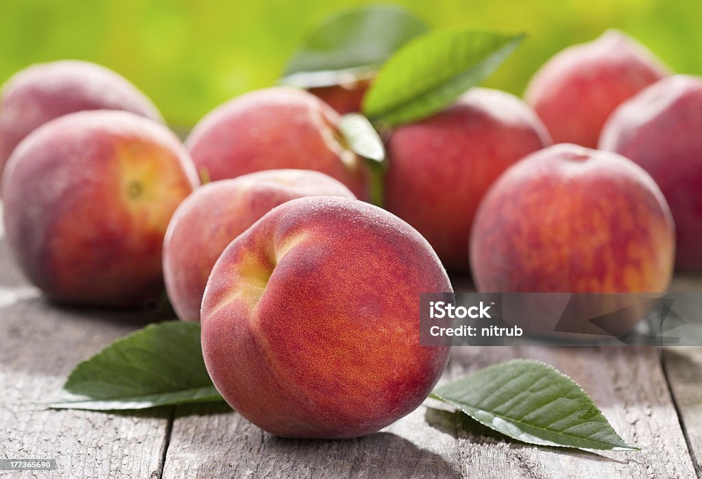 fresh peaches fresh peaches on wooden table Food Stock Photo