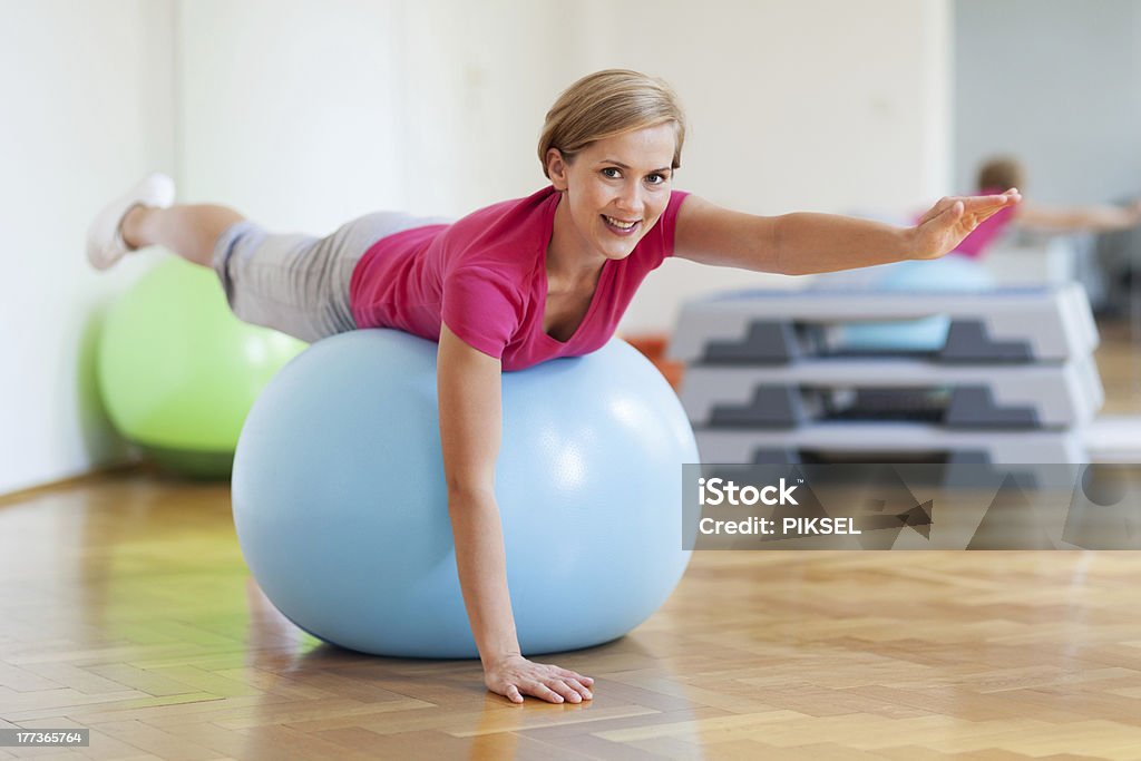 Woman on fitness ball Active Lifestyle Stock Photo