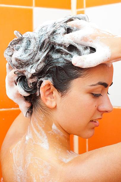 istock Girl washing hair 177369347