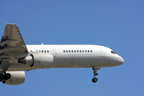 Close view of a commercial aircraft in flight