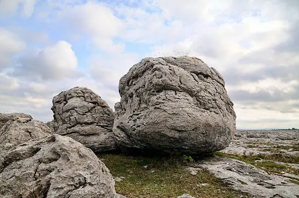 "The Burren is a karst-landscape regionin northwest County Clare, in Ireland. Boulders."