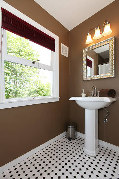istock Brown small bathroom with antique sink and tiles. 177373226