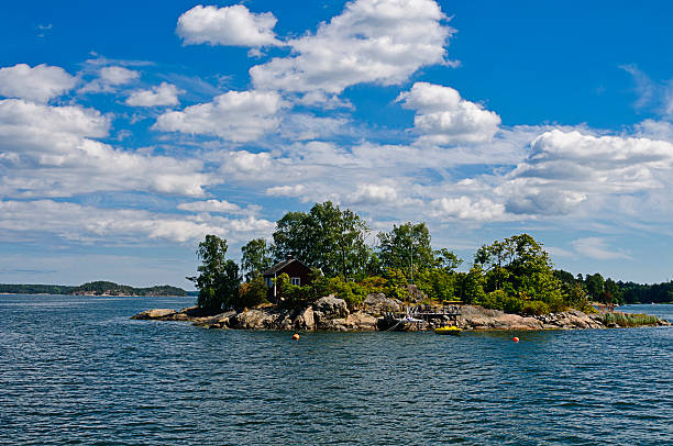 istock Swedish red cottage on a small island 177373401