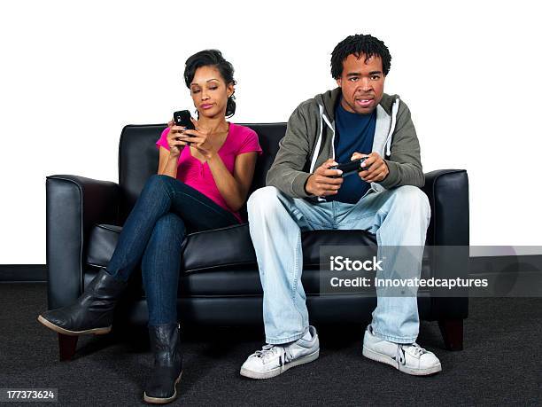 Black Male Is Ignoring His Girlfriend While Playing Video Games Stock Photo - Download Image Now