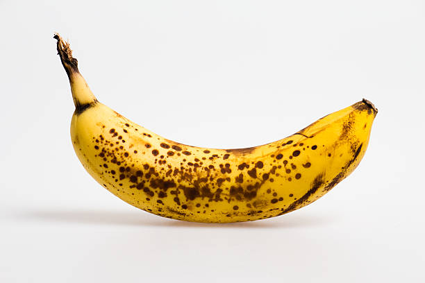 Ripe Banana Ripe Banana on white background with soft shadow ripe stock pictures, royalty-free photos & images